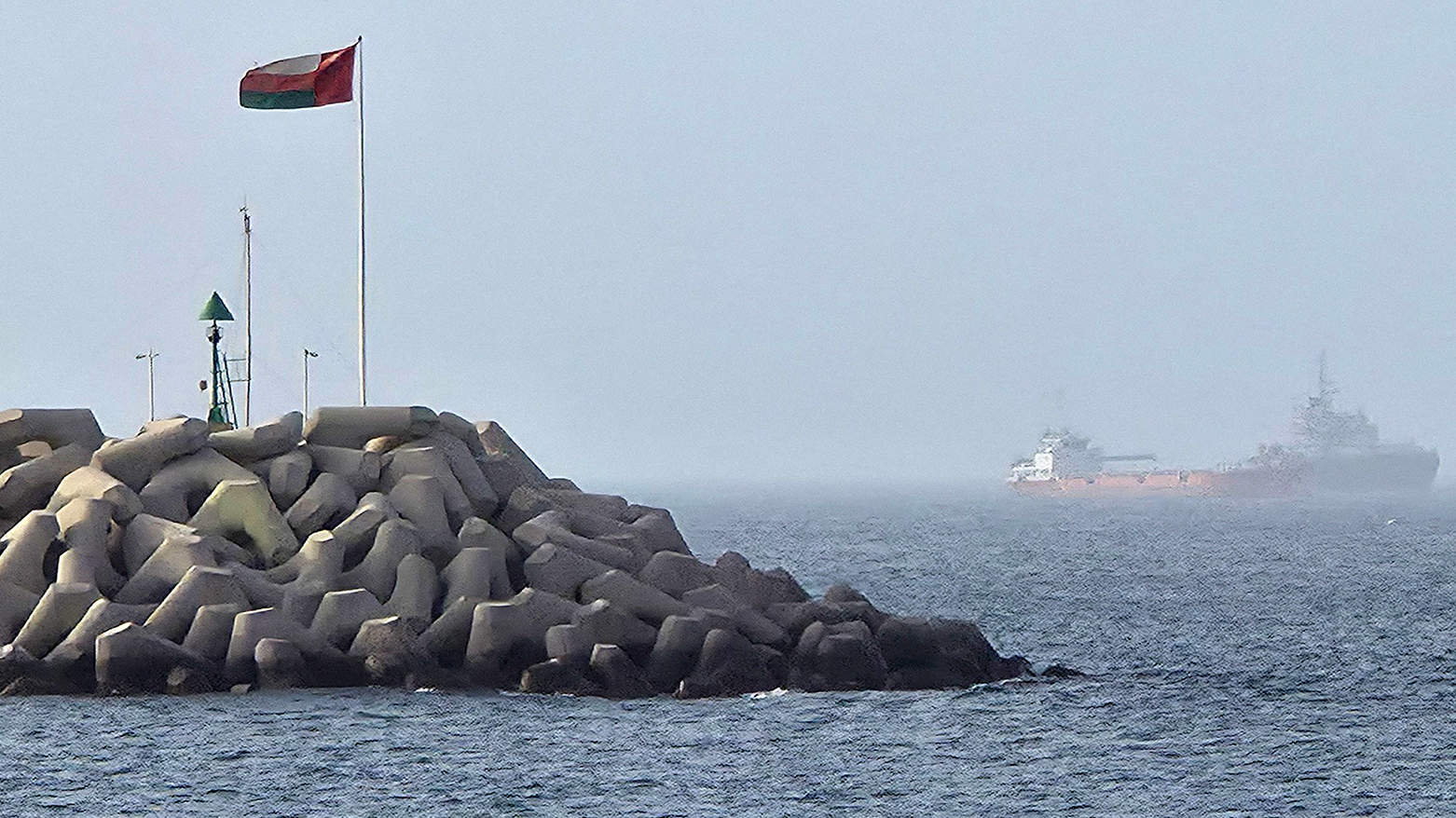 Vessels transiting through the Gulf of Oman are pictured off the coast of Muscat on July 25, 2026. (AFP)