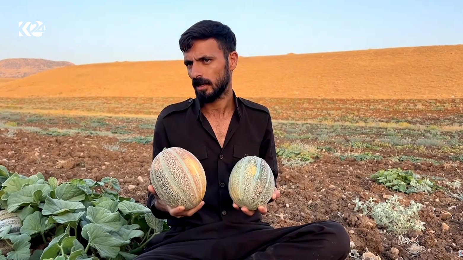 A Kurdish farmer holding locally grown cantaloupes. (Photo: Kurdistan24)