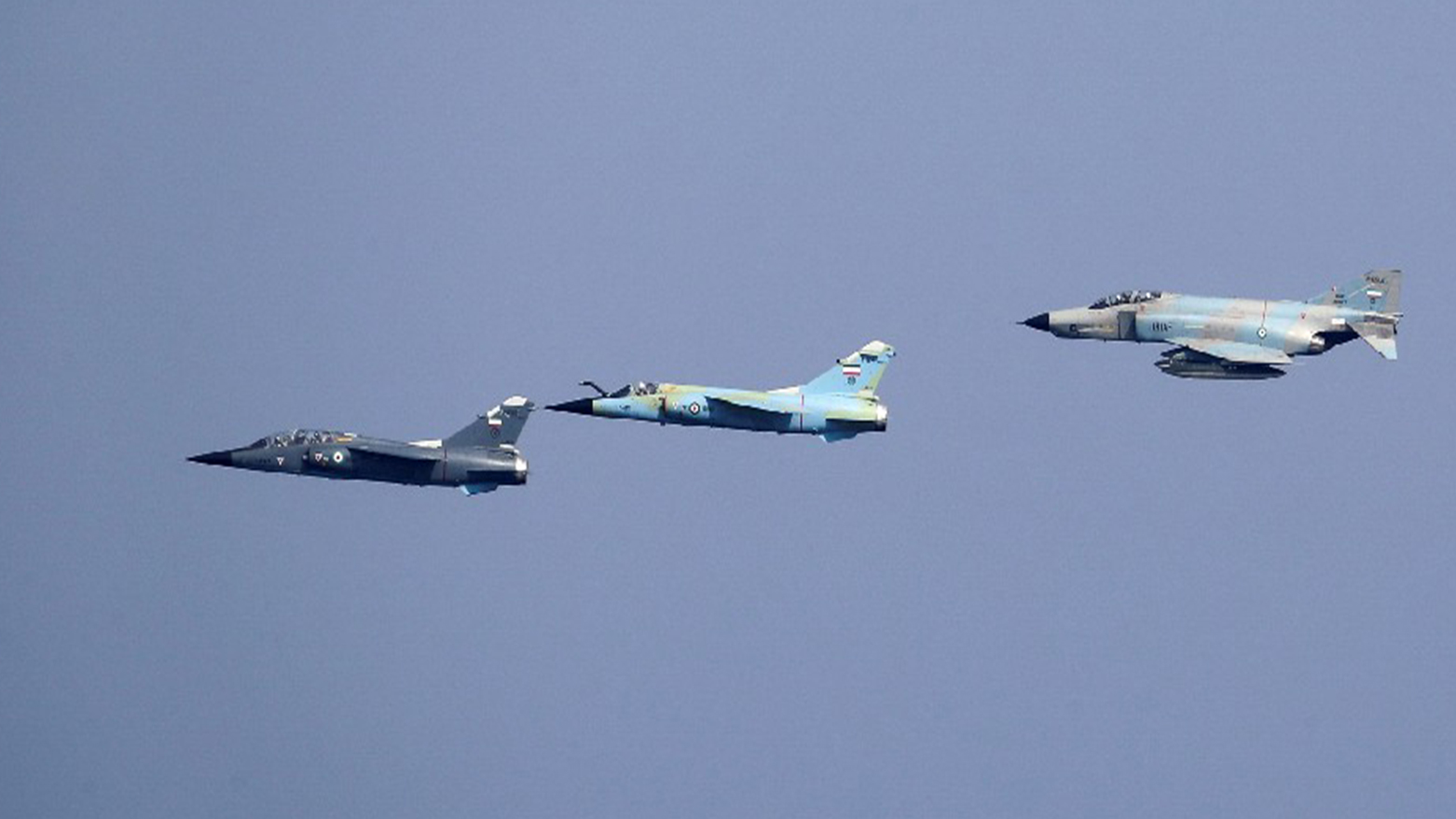 Iranian fighter jets taking part in a military exercise on the shore of the Oman sea in the coastal region of Balushistan, Nov. 9, 2021. (AFP)