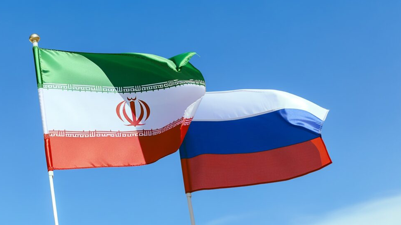 Iranian flag (L), and the Russian flag (R). (Photo: Kurdistan24/AI)