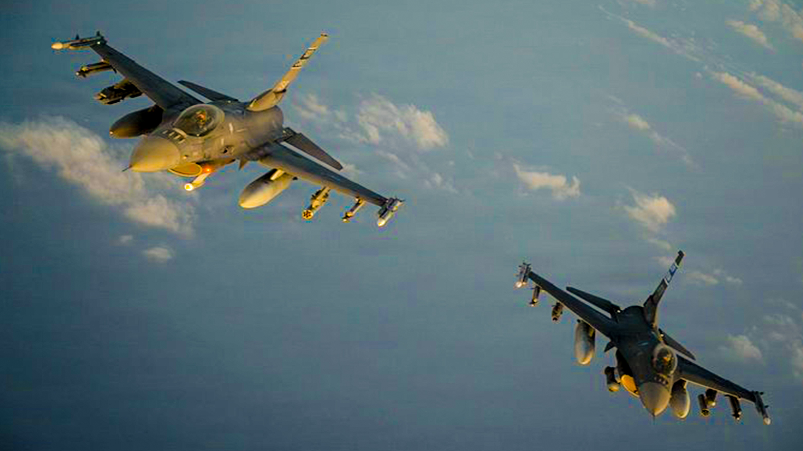 Two U.S. Air Force F-16 fighter jets patrol the skies over the Middle East. Photo: CENTCOM)