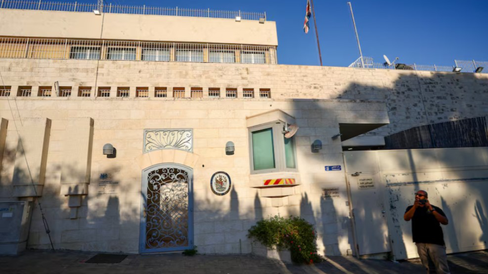 A person stands outside the British Consulate in the West Bank, in Jerusalem, Sept, 2026. (AFP)