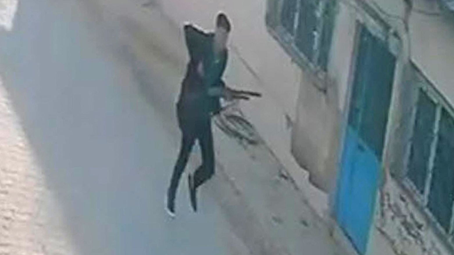 CCTV image released by Türkiye’s DHA on Sept. 22, 2026, showing a gunman near a school in Turgutlu, Manisa. (Photo: DHA)