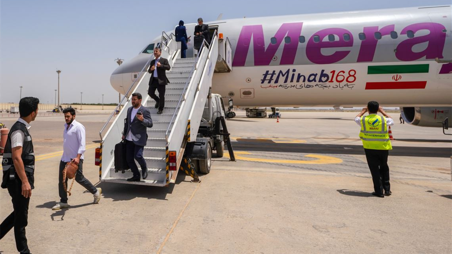 Passengers disembark an Iranian plane in Najaf airport, Najaf, Iraq, Friday, May 8, 2026. (AP)