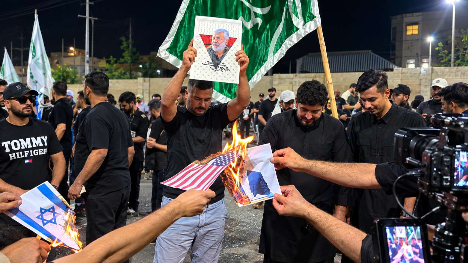 بەهۆی سوتاندنی وێنەی عەلی زەیدی و ئاڵای ئەمریکا بەرپرسێکی حەشدی شەعبی دەستگیرکرا