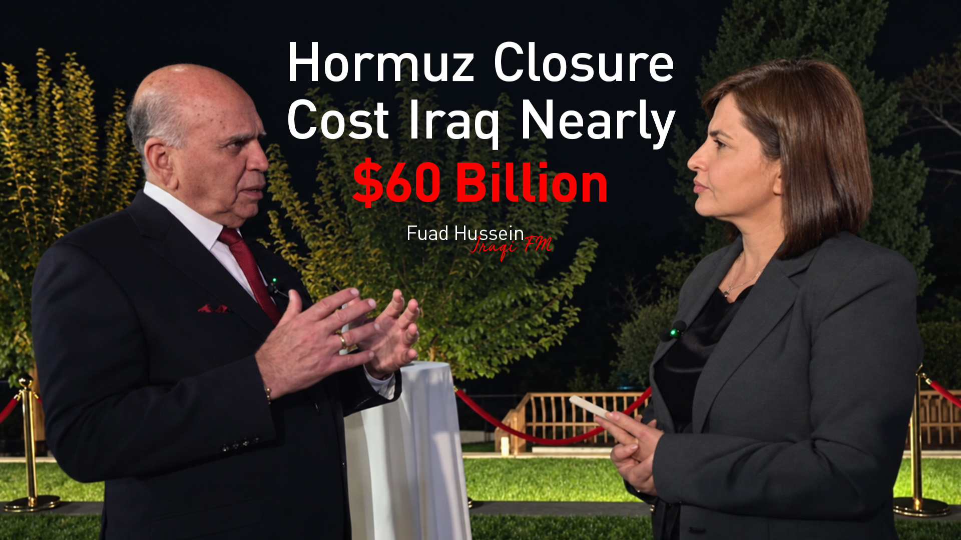 Iraqi Foreign Minister Fuad Hussein (L) speaking with Kurdistan24 correspondent Awara Hawrami (R). (Graphics: Kurdistan24)