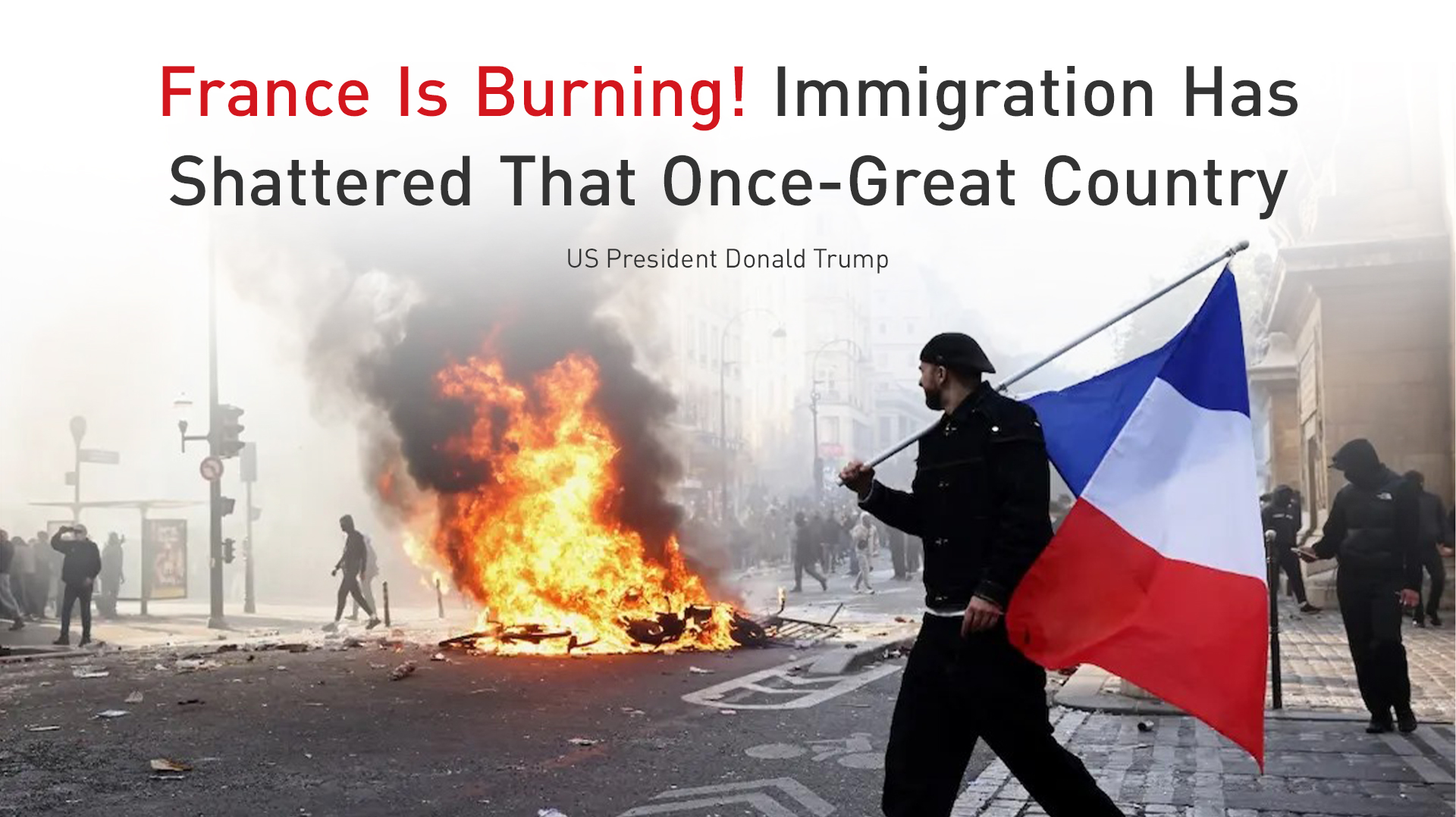 A demonstrator holds a French flag amid fires and street chaos during protests in Paris, France, on October 17, 2017. (Graphic: Kurdistan24)