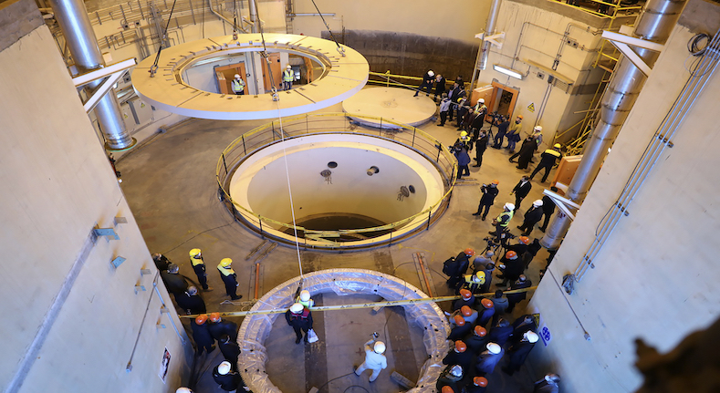 In this Dec. 23, 2019 photo, technicians work at the Arak heavy water reactor's secondary circuit, as officials and media visit the site, near Arak, Iran, 150 miles southwest of Tehran. (Photo: Atomic Energy Organization of Iran via AP)