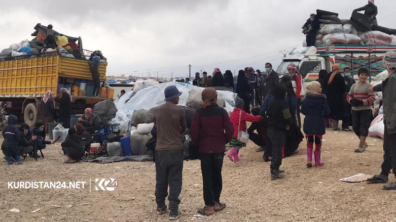 Families held in northern Syria's sprawling al-Hol camp prepare to be transfered to another location. (Photo: Kurdistan 24)