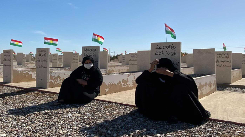 Two Kurdish women mourn the victims of the Anfal on its 33th anniversary in the Garmiyan area,  April 14, 2021. (Photo: Harem Jaff / Kurdistan 24)