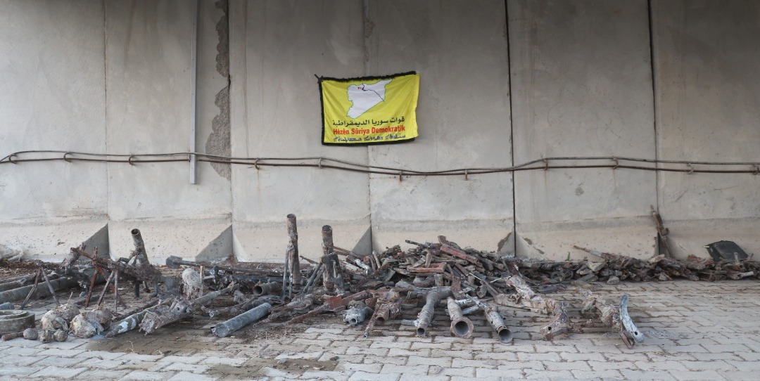 SDF forces said they uncovered an underground ISIS weapons depot in Raqqa, Syria on April 15, 2021. (Photo: Hawar News Agency)