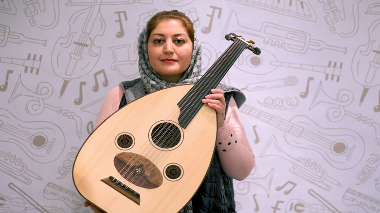 Oud master Nouchine Pasdar, 40, poses for a picture during an interview in the Iranian capital Tehran, Feb. 6, 2021. (Photo: Atta Kenare / AFP)