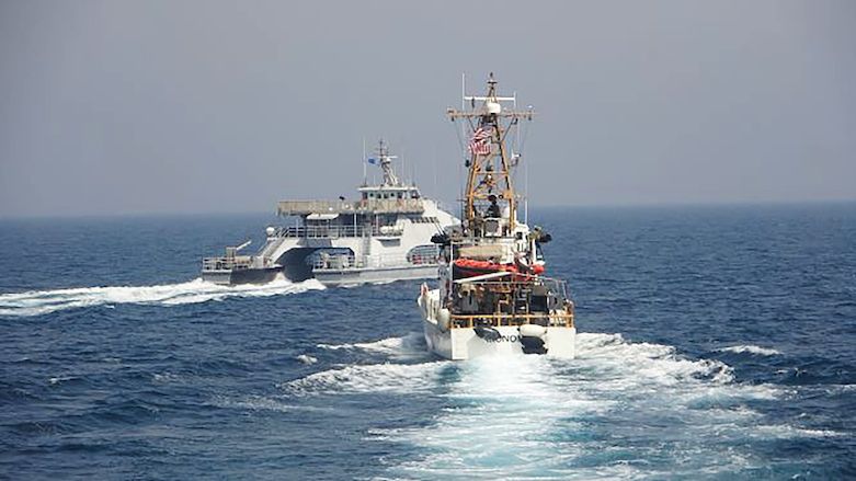 A US Navy photo shows an encounter between Iran’s IRGC Navy boat Harth 55, left, and the US Coast Guard patrol boat USCGC Monomoy in the Persian Gulf on April 2, 2021. (Photo: US Navy)