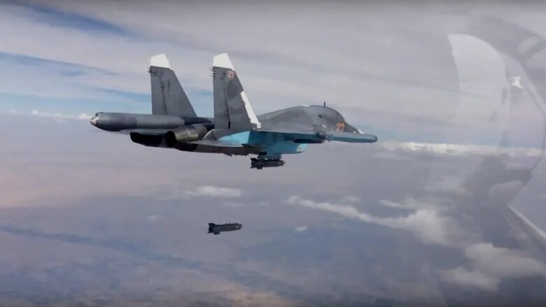 Russian Su-34 Fullback fighter-bomber drops a bomb on Syria, Oct. 9, 2015 (Photo: Russian Defense Ministry footage via AP)