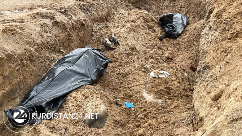 Bodies wrapped in plastic bags at a mass grave in Ukraine's Bucha, Apr. 5, 2022. (Photo: Azad Altun/Kurdistan 24)