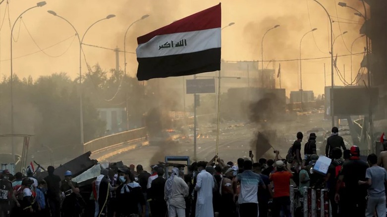 Anti-government protesters set fire and close streets during protests in Baghdad, Iraq, Nov. 10, 2019. (Photo: Hadi Mizban/AP)