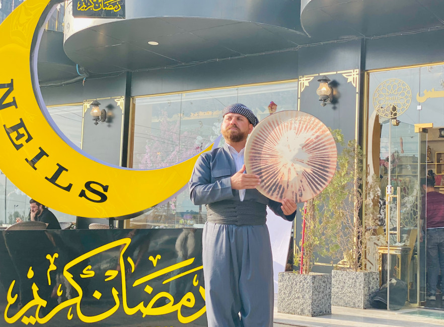 Dervish wearing traditional Kurdish clothes with a daff in Duhok, Apr. 7, 2022 (Photo: Kurmanj Nhili)