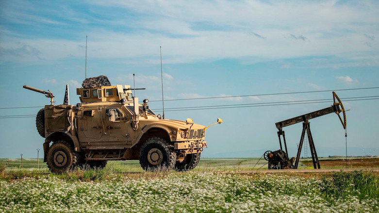 A US armored military vehicle patrols oil fields in the town of Qahtaniyah in northeastern Syria's Hasakah province, May 8, 2020. (Photo: Delil Souleiman/AFP)