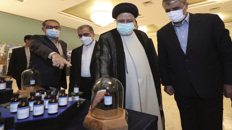 Iranian President Ebrahim Raisi, second right, receives an explanation while visiting an exhibition of Iran's nuclear achievements in Tehran, Iran, Saturday, April 9, 2022. (Photo: Iranian Presidency Office via AP)