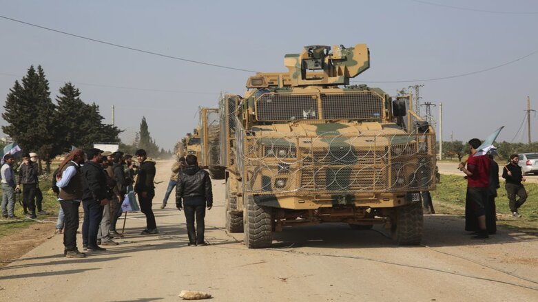 Syrians block Turkish military convoy in Neyrab, Sunday, March 15, 2020 as they protest agreement on joint Turkish and Russian patrols in northwest Syria. (Photo: AP)