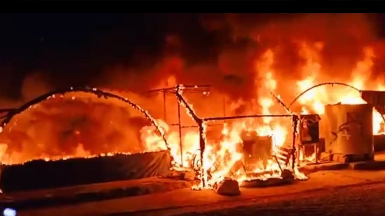 Three tents were burned in the fire (Photo: Iraqi News Agency)