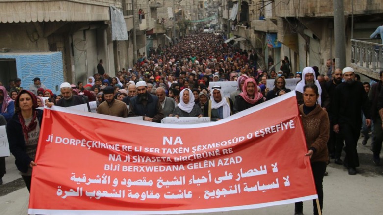 Thousands of people in the Al-Ashrafiyyah and Sheikh Maqsoud protested the Syrian government blockade (Photo: SDC)