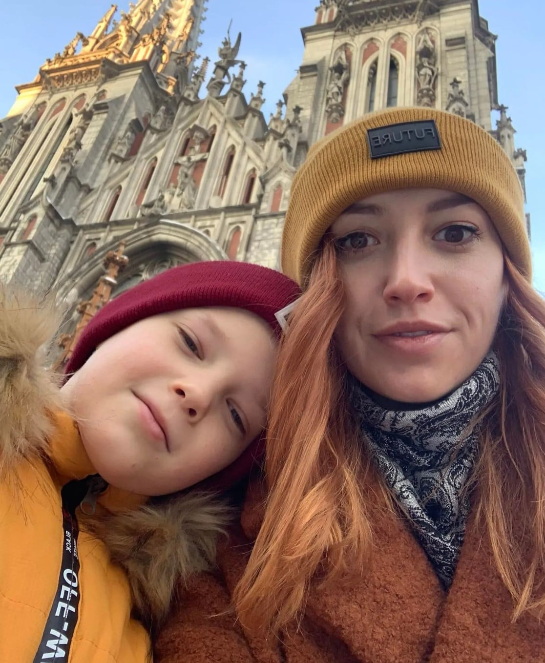 ئۆلینا كۆشنێر و هاوسەرەکەی و منداڵەکەی