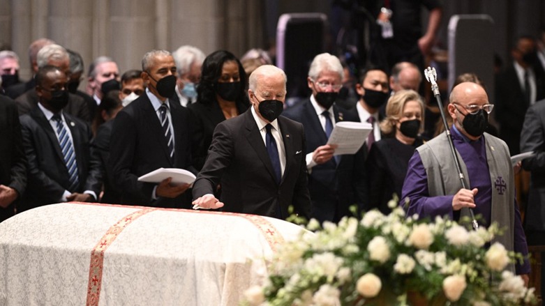 US President Joe Biden pays his respects at the casket of former Secretary of State Madeleine Albright during a funeral service at the Washington National Cathedral in Washington, DC, April 27, 2022. (Photo: Brendan Smialowski/AFP)
