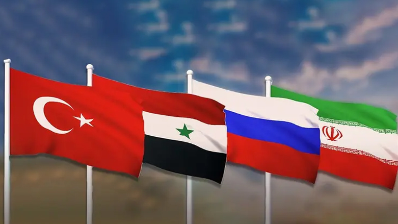 أعلام الدول الأربع المشاركة في الاجتماع (العربية نت)
