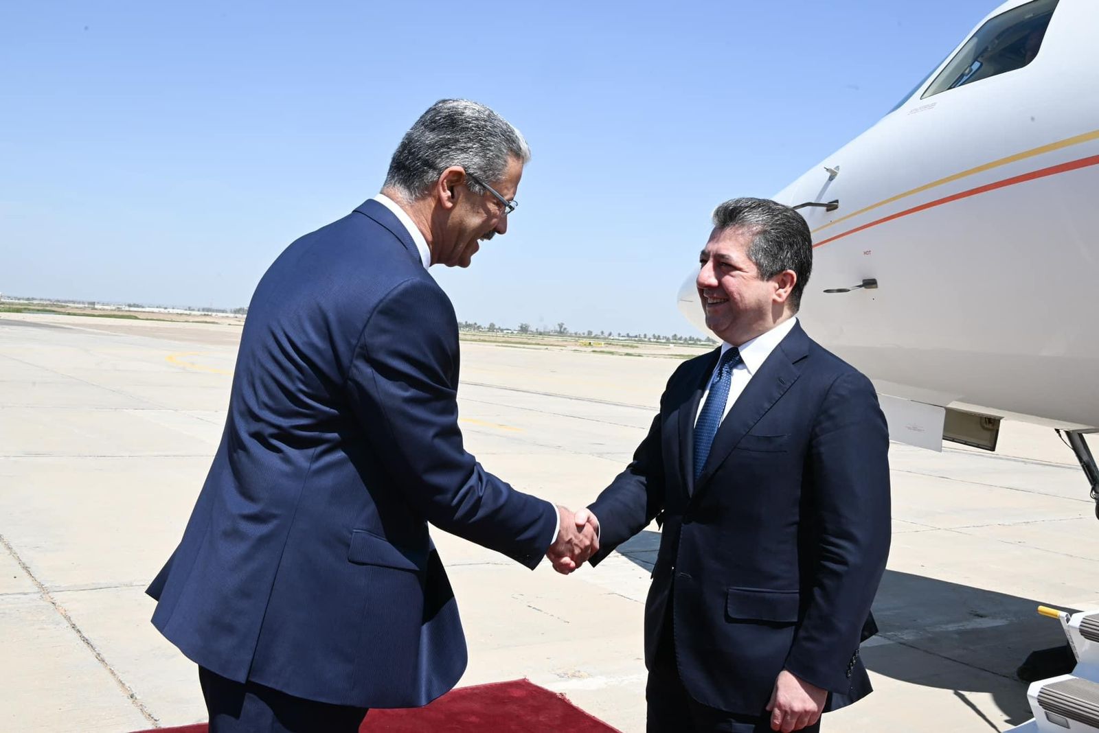 پێشوازیکردنی سەرۆکوەزیران مەسرور بارزانی لە فڕۆکەخانەی نێودەوڵەتی بەغدا
