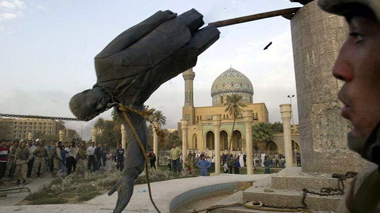 The toppled statue of Saddam Hussein is seen in Firdos Square downtown Baghdad in this April 9, 2003. (Photo: Jerome Delay/ AP)