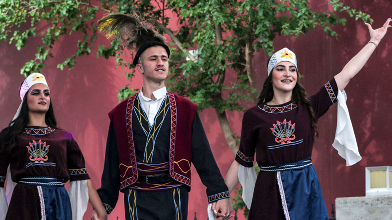 Members of a Syriac Christian dance troupe perform during the Syriac Heritage Festival in the Kurdistan Region's capital Erbil, April 11, 2023. (Photo: Safin Hamed/AFP)