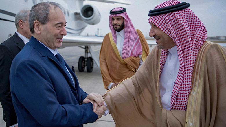 Saudi Deputy Foreign Minister Walid al-Khuraiji (right) receiving Syrian Foreign Minister Faisal Mekdad upon his arrival at the airport of Jeddah, April 12, 2023. (Photo: SPA/AFP)