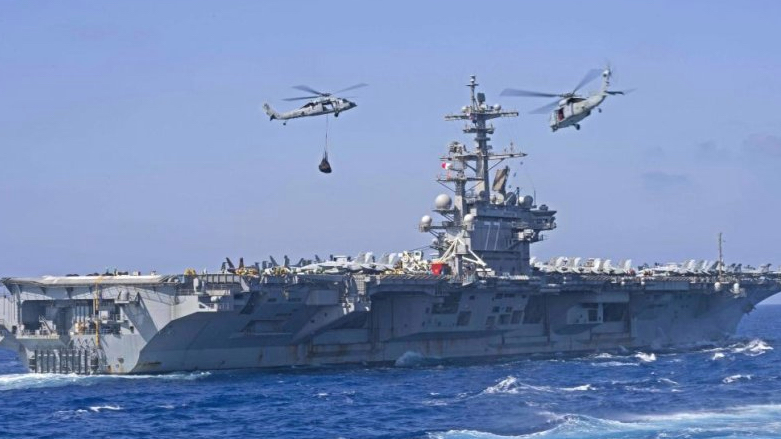 The USS George H.W. Bysh Nimitz-class aircraft carrier is seen during a resupply operation (Photo: U.S. Navy photo)