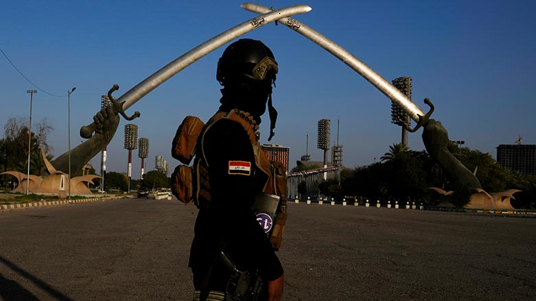 An Iraqi soldier passes under the Victory Arch monument built by former Iraqi President Saddam Hussein in Baghdad, Iraq, Feb 28, 2023. (Photo: Hadi Mizban/ AP)