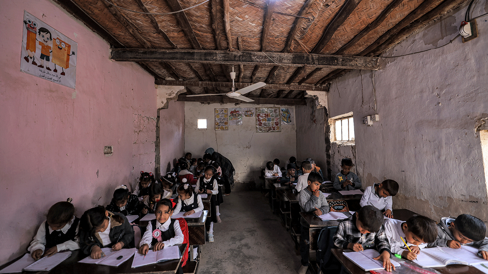 Students attend class at the mixed-gender al-Tafawuq elementary school, in the Bani Saad district in Iraq's Diyala province on March 10, 2024. (Photo: AFP)