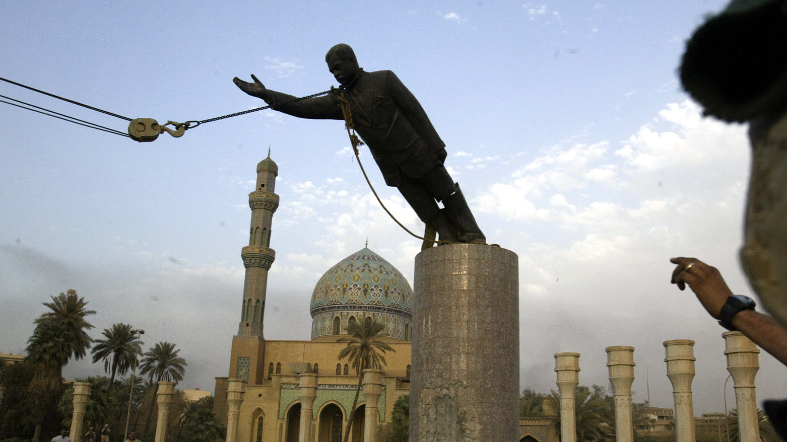 A statue of Saddam Hussein being toppled in Firdaus Square, in downtown Bagdhad in this April 9, 2003.  (Photo: AP/Jerome Delay)