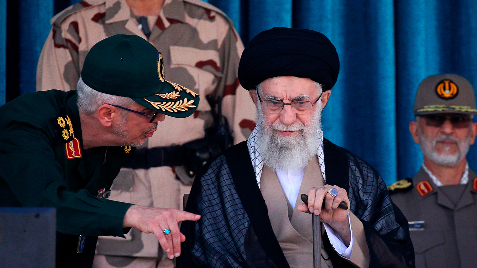 The Iranian supreme leader, Supreme Leader Ayatollah Ali Khamenei, center, listens to chief of the General Staff of the Armed Forces Gen. Mohammad Hossein Bagheri. (Photo: Office of the Iranian Supreme Leader via AP)