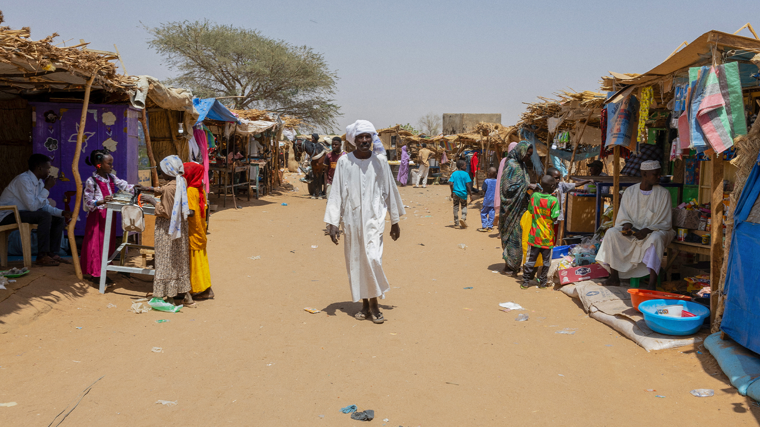 A man walks in the market of the Adre refugee camp, on April 10, 2024. (Photo: AFP)