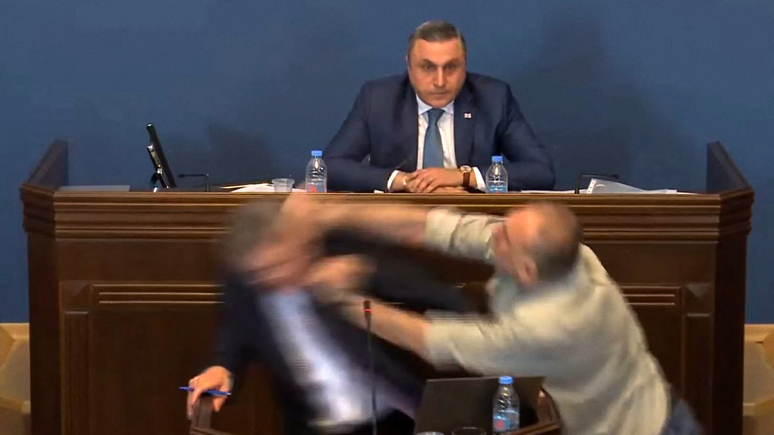 This frame grab shows members of Parliament fighting during a plenary session in Tbilisi. (Photo: AFP)