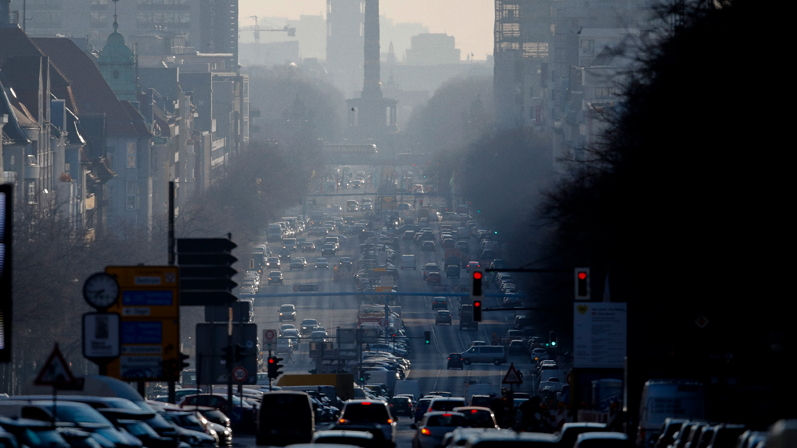 Cars drive on the Bismarckstrasse road, a main entrance road in the German capital during rush hour time in Berlin, Germany, Tuesday, March 24, 2020. (Photo: AP/Markus Schreiber)