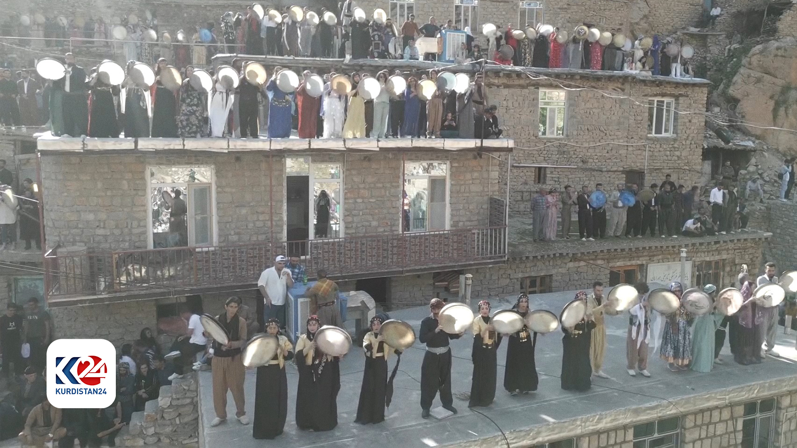 Another view of the festival, male and female daf players during the festival.