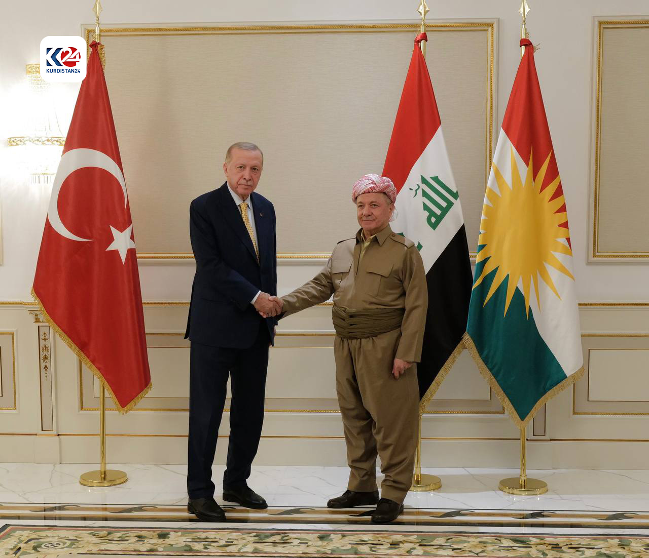 Kurdistan Democratic Party (KDP) President Massoud Barzani (right) shaking hands with Turkish President Recep Tayyip Erdogan, April 22, 2024. (Photo: Barzani Headquarters) 