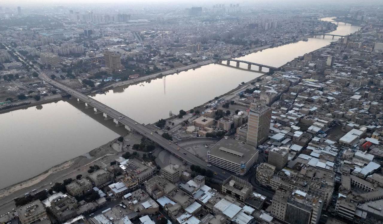 This aerial photograph taken shows a view of buildings and bridges over the Tigris river in Baghdad, Iraq, Jan. 1, 2024. (Photo: Murtaja Lateef/AFP)