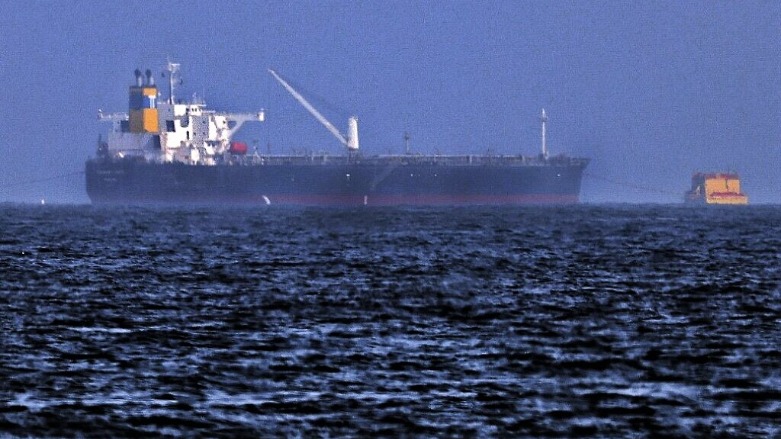 Tug boats are moored next to the Israeli-managed tanker MT Mercer Street off the Fujayrah port in the United Arab Emirates, Aug. 3, 2021. (Karim Sahib/AFP)