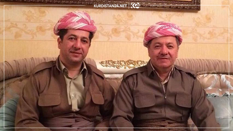 Prime Minister Masrour Barzani (left) sits beside President Masoud Barzani, the KDP's leader. (Photo: Archive)