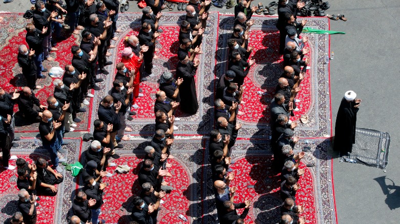 Iranian and Iraqi Shiite Muslims gather to pray on the tenth day of the month of Muharram which marks the peak of Ashura, in the Iranian capital Tehran, on August 19, 2021.