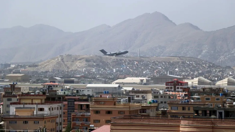 US military aircraft takes off at the Hamid Karzai International Airport in Kabul, Afghanistan, Saturday, Aug. 28, 2021. (Photo: Wali Sabawoon / AP)