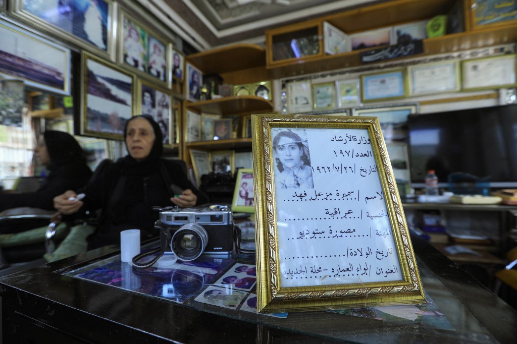 Iraqi photographer Samira Mazaal works at her studio in the city of Amarah in Iraq's southeastern Maysan province , July 9, 2022. (Photo: Asaad Niazi/AFP) 
