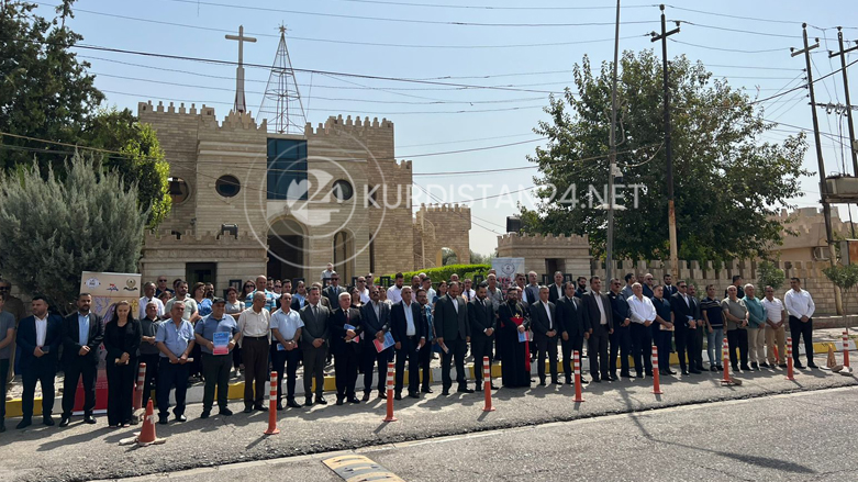 Assyrian intellectuals and religious leaders standing for a moment of silence in the Kurdistan Region's Ankawa district to commemorate the 89th anniversary of the Simele massacre, August 7, 2022. (Photo: Shayma Bayiz/Kurdistan 24)